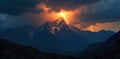 Intense lightning strike illuminating a rugged, desolate mountain landscape during a severe thunderstorm at night. A dramatic, Royalty Free Stock Photo