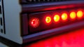 Intense Red Glow of a Power Button on a Futuristic Tech Panel Royalty Free Stock Photo