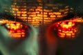 Intense Red Glowing Eyes Piercing Through Binary Code Veil, Concept of Cyber Security, Artificial Intelligence, and Hacker Attack Royalty Free Stock Photo