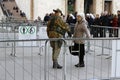 Intense security: security guard checking elderly woman in Milan