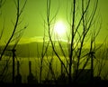 Intense sunrise through the bushes with power plant Royalty Free Stock Photo