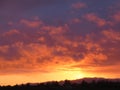 Intense Sunset along Oregon Freeway with Silhouette of Hill