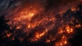 Intense wildfire consuming forest at night