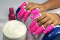 Intensely pink clips for the removal of nail acrylic, glitters,