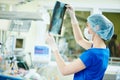 Intensive care unit female doctor with x-ray image Royalty Free Stock Photo