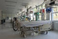 Intensive care unit in hospital, beds with monitors an ventilators, a place where they are treated patients with pneumonia caused