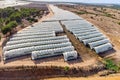 Intensive cultivation field with plastic-covered crops full of greenhouses cultivation for strawberries, strawberries from Palos