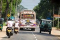 Intensive traffic on a narrow asian street Royalty Free Stock Photo