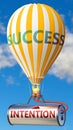 Intention and success - shown as word Intention on a fuel tank and a balloon, to symbolize that Intention contribute to success in