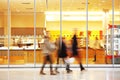 Intentional Blurred Image of Young People in Shopping Center Royalty Free Stock Photo