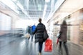Intentional Blurred Image of Young People in Shopping Center Royalty Free Stock Photo