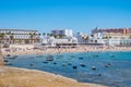 Intentional blurred wall overlooking La Caleta beach and architecture of the Our Lady de la Palma y del Real spa, CÃÂ¡diz SPAIN