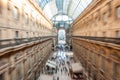 Intentionally blurred abstract view of Galleria Vittorio Emanuele II with people shopping in Milan, Italy. Royalty Free Stock Photo