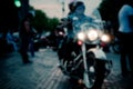 Intentionally Blurred Background. Couple of Bikers on Evening