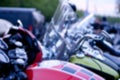 Intentionally Blurred Background. Motorcycles Parked in a Row. Royalty Free Stock Photo