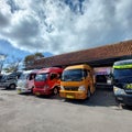 inter-city vehicles parked neatly at the terminal