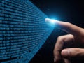 Interacting with binary code on digital interface Royalty Free Stock Photo