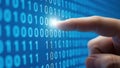 Interacting with binary code on a digital screen Royalty Free Stock Photo