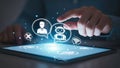 Interacting with digital communication icons on a tablet Royalty Free Stock Photo