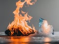 Interaction of fire and ice showcasing contrasting elements in a colorful display. Royalty Free Stock Photo