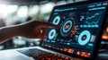 Interactive Data Analysis User Navigating Futuristic Analytics Dashboard on Laptop Touchscreen. Royalty Free Stock Photo