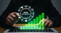 Interactive Risk Management Display with Financial Growth Indicators and a Person Analyzing Data on Laptop Royalty Free Stock Photo