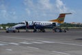 An InterCaribbean Airways Embraer 120 plane on tarmac at Maurice Bishop International Airport in Grenada