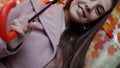 Interception portrait of Charming young long haired woman under umbrella