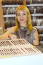 Intercharm XII International Perfumery and Cosmetics Exhibition Moscow Autumn Young blonde woman works in the exhibition Royalty Free Stock Photo