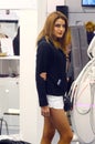 Intercharm XXI International Perfumery and Cosmetics Exhibition Young woman in a black jacket from the team of LPG Shine