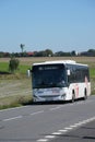 Intercity bus on the rural road Royalty Free Stock Photo
