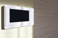 Smart home control panel enhances modern apartment design with sleek features Royalty Free Stock Photo