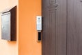 Intercom with doorbell buttons and video call and card reader for electronic access key.