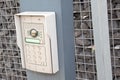 Intercom doorbell ring surveillance video on modern house entrance with contemporary door bell facade door
