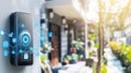 Black retro vintage style intercom system on the wall with glowing blue button and icons, adding nostalgic charm to the Royalty Free Stock Photo