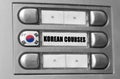 On the intercom there is a button with the flag of South Korea and the inscription - Korean language courses Royalty Free Stock Photo