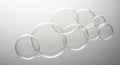 Interconnected transparent soap bubbles forming a cluster on a white background clear Royalty Free Stock Photo