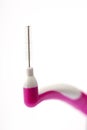 The interdental brush close-up isolated on white background Royalty Free Stock Photo