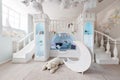 Interer of a spacious blue children`s room. decorative castle game