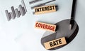 INTEREST COVERAGE RATE text on wooden block on chart background Royalty Free Stock Photo