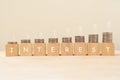 Interest on wooden cube and coins stacked in bar graph with upward arrow on top.