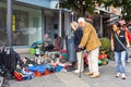 interested buyers checking the offers on a flea market