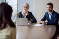 Interested hr managers focused on listening applicant at job interview