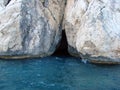 Amazing views from a pleasure yacht on the rocky coast of the Lycian Trail washed by the azure sea.