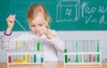 Interesting approach to learn. Future scientist. Explore and investigate. School lesson. Girl cute school pupil play Royalty Free Stock Photo