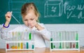 Interesting approach to learn. Future scientist. Explore and investigate. School lesson. Girl cute school pupil play Royalty Free Stock Photo