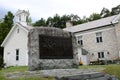Exterior architecture with stone and bronze tablet in front, describing history, Bennington Museum, Vermont, Summer, 2022