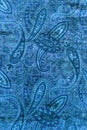 Interesting blue paisley patterned background.