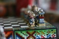 Interesting chess pieces on a chessboard Royalty Free Stock Photo