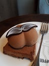 interesting chocolate cake on the disc, and with one fork.